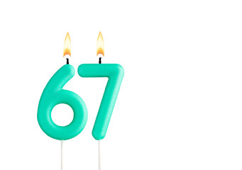 Birthday number 67 - Green birthday candle on white background