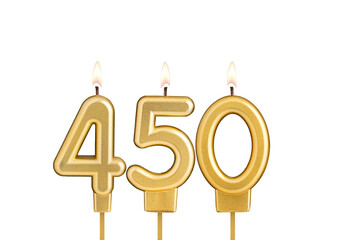 Birthday candle number 450 on white background
