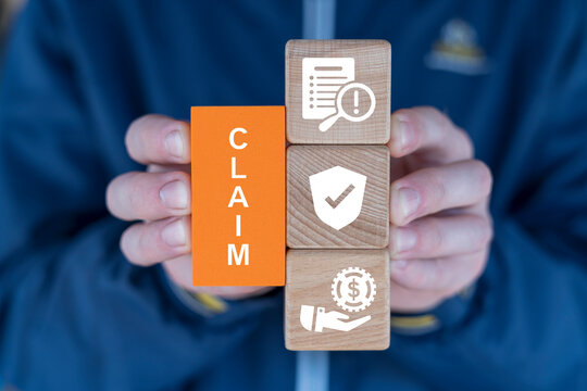Man holding blocks with icons and text sees word: CLAIM. Claims Management Business Department Concept. Registration claim document.