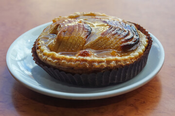 Apple tart on a white plate