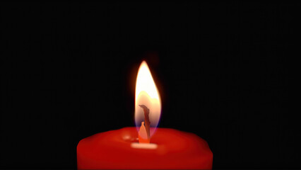 Halloween red candle with a glowing flame in the dark