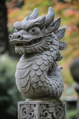 Stone dragon statue in a garden, close up