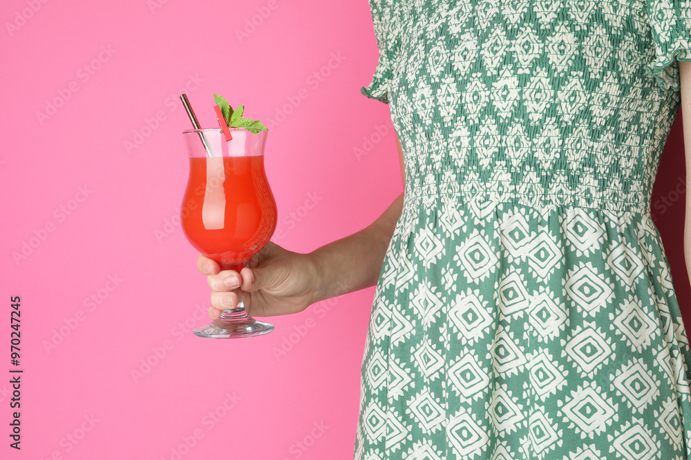 Canvas Prints Woman with glass of refreshing cocktail on pink background, closeup