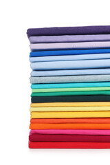 Stack of clean colorful t-shirts isolated on white