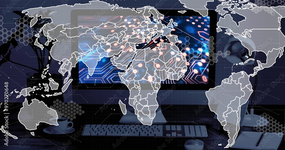 Poster image of world map over computer screen with computer circuit board