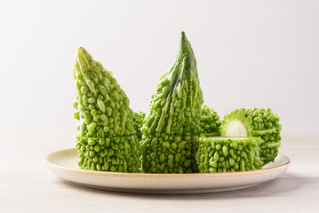 Fresh bitter gourd on white background, Food ingredient for cooking local thai food