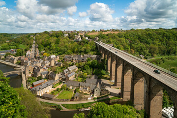 Panoramic view of the city and the viaduct bridge over the Rance River on a sunny summer day,...