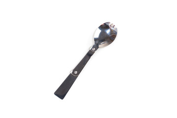 Jointed silver spork in a straight line shape isolated over white