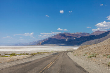 A scenic view along Badwater Road in Death Valley National Park, California, showcasing the vast...
