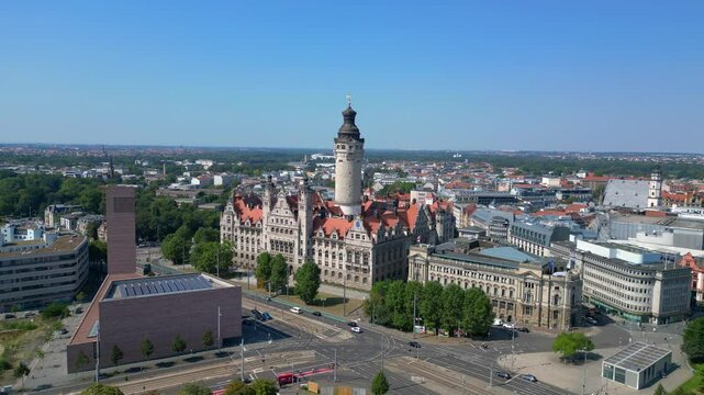 leipzig new city hall, a stunning example of german renaissance architecture, surrounded by the bustling city on a bright summer day. Great aerial view flight drone shot footage from above
