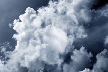 white fluffy clouds in the blue sky .blue sky background with tiny clouds