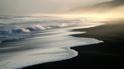 Fototapeta premium Misty shoreline with gentle waves at sunrise