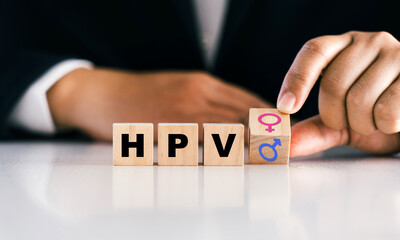 HPV (Human Papillomavirus) is an abbreviation on a wooden block. It can affect both women and men.