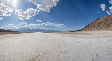 The salt flats at Badwater Basin in Death Valley, California, are remnants from an ancient lake...