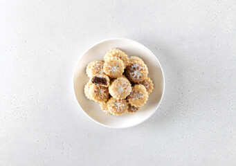 Arabic oriental cookies dates maamoul eid al fitr on a white background. Copy space.