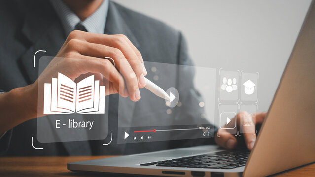 E-library concept. Person use laptop with virtual E-book icons for electronic books online, knowledge base on internet, digital library or e-library. Internet e-learning lessons and online