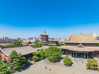 Aerial photography of Huayan Temple in Datong, Shanxi Province on a sunny summer day with blazing clouds