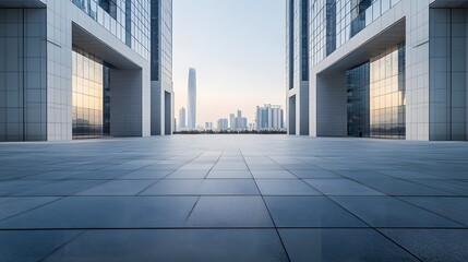 Fototapeta premium Empty Plaza Between Two Modern Glass Buildings with City Skyline in the Background