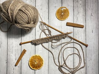 Clew of wool and knitting and needles needlework hobby relax art decor design background handmade warm thing 
