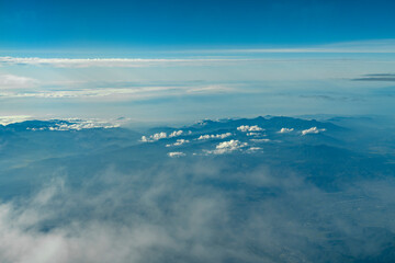 aerial view of mountain range in fog
