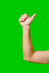 Hand Giving Thumbs Up Gesture Against Bright Green Background