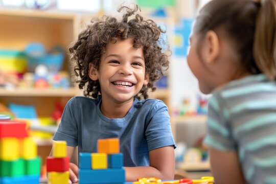 Portrait of a child with autism working with a therapist during a session, both smiling and interacting positively. The therapy room is welcoming and filled with educational tools.