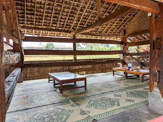 In this close-up, a cozy seating area in a restaurant with a 