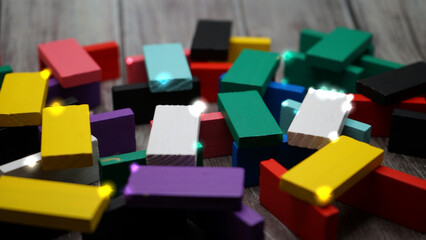 Bokeh photography of colorful bricks in sparks on grey backgrounds