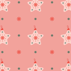 pattern of festive ornaments in the shape of a star for a Christmas tree on a pink background