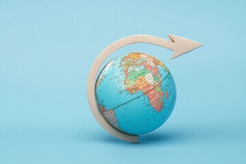 Fototapeta premium A curved arrow wrapping around a globe, symbolizing global direction or connectivity. 