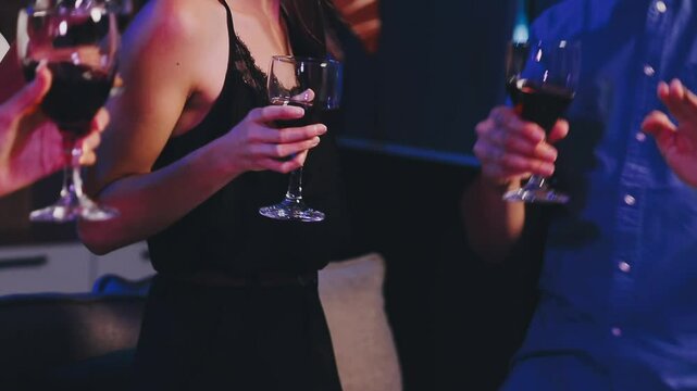 Happy friends having bbq dinner party at backyard -Multiracial young people eating food and drinking red wine in garden restaurant