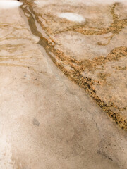 Stone and stone wall in the desert and sand