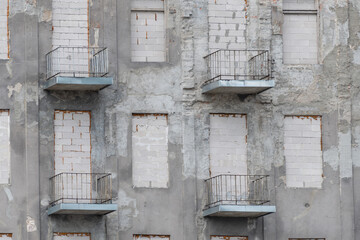 Building with brick-built windows. abandoned building.