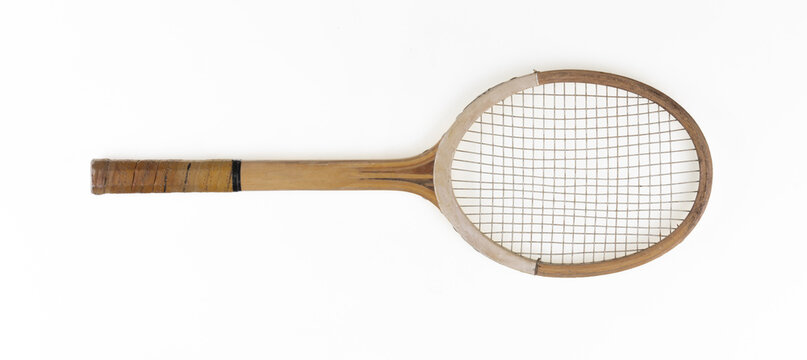 old wooden tennis racket isolated on white background