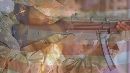 Animation of flag of usa over biracial male soldier shooting with rifle