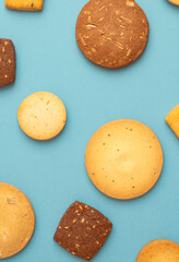 cookies on the light blue background. 水色背景の上に置かれたクッキー	
