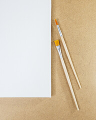 white canvas with brushes