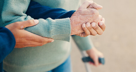 Park, walking and hands of caregiver with senior person for assisted living, support and care in...