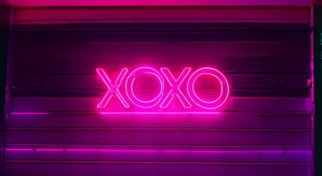 Word "XOXO" in neon lights.