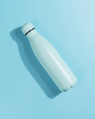 light blue water bottle on light blue background