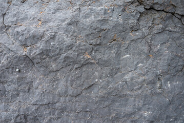 Fototapeta premium Stone texture. Gray natural rock. Perfect for background.