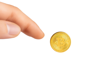 A hand gently reaches for a gold Bitcoin, symbolizing the digital currency's growing influence in modern finance.