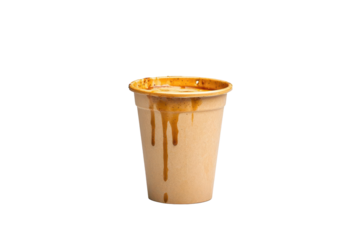 A paper cup with coffee, stained and dripping, showcasing the remnants of a refreshing beverage.