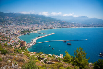 Fototapeta premium Panoramic view of the harbor of Alanya on a beautiful summer day, Turkey 