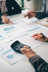Young colleagues discussing financial business and analysis Teamwork concept in modern office...