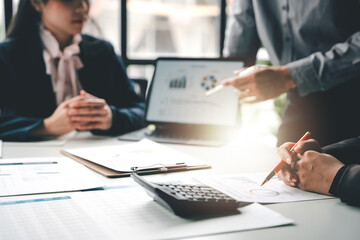 Meeting to discuss financial business teamwork Brainstorm marketing strategies Prepare documents and digital work at the office