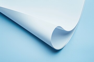 A blank sheet of paper sitting on a blue surface