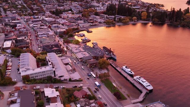 TSS Earnslaw docked at Queenstown during a spectacular sunrise over Lake Wakatipu