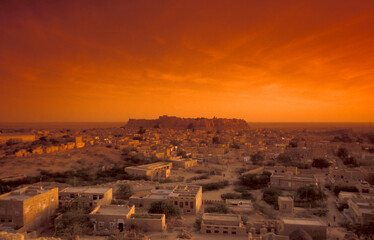 Fototapeta premium a view of the Jaisalmer Fort with the city of Jaisalmer in the Province of Rajasthan in India. India, Jaisalmer, January, 1998