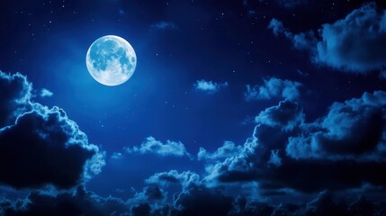 A breathtaking night sky showcasing a bright full moon surrounded by wispy clouds, creating a serene and tranquil atmosphere.
